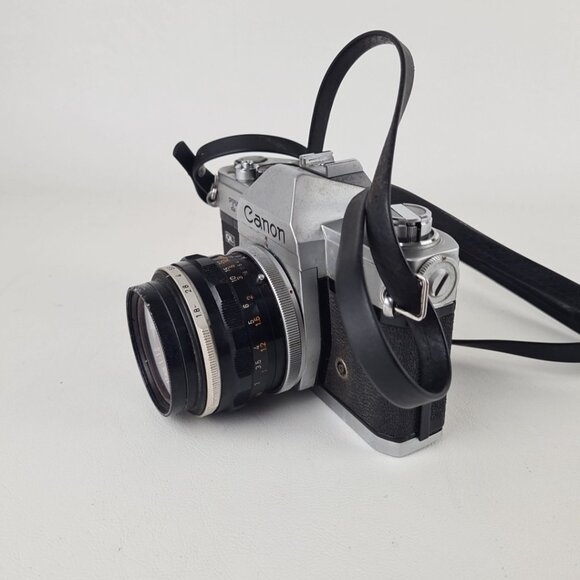 Canon TL QL 35mm SLR Film Camera with 50mm FL 1:1.8 Lens & Strap Vintage - Picture 1 of 13